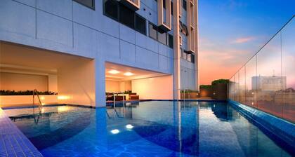 Modern Chic Condo with Pool & Gym in Katipunan Ave, Quezon City - Slate Studio