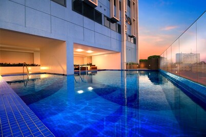 Modern Chic Condo with Pool & Gym in Katipunan Ave, Quezon City - Slate Studio