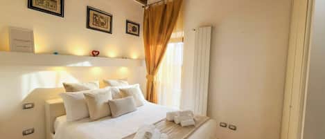 2 bedrooms, iron/ironing board, travel crib