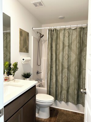 Hair dryer, towels, soap, toilet paper