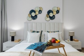 1 chambre, coffre-fort, fer et planche à repasser