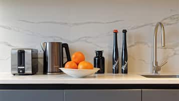 Monolocale Standard | Cucina privata | Frigorifero, piano cottura, lavastoviglie, pentole/stoviglie/utensili