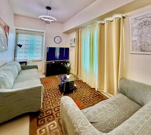 Familienapartment, Stadtblick | Wohnbereich