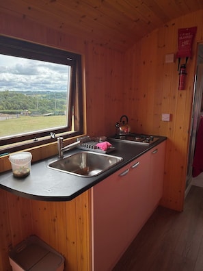 Fridge, stovetop, electric kettle, toaster