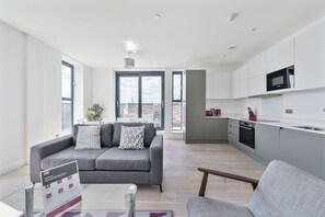 Apartment, 4 Bedrooms | Living area