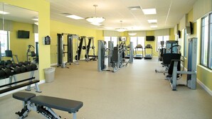 A gym with various exercise equipment, mirrors, and a bench. - Family 5BD Spa Pool Game Loft Near Disney (Kissimmee)