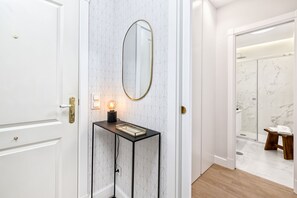 Shower, hair dryer, towels