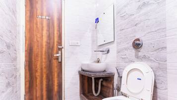 Triple Room | Bathroom | Shower, slippers, towels, soap