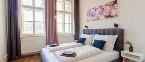 2 slaapkamers, een strijkplank/strijkijzer, reisbedje, wifi