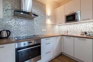 Fridge, microwave, oven, stovetop - Heart of Prague | Large, Elegant 2BR Apartment (Prague)