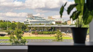 A view of a modern building complex with multiple structures, including a bus station labeled "The Old Bus Station." - Cosy Stay in a Two Bed Flat (Milton Keynes)
