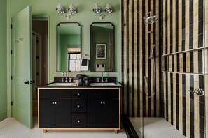 Shower, hair dryer, towels, shampoo