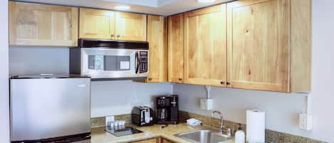 Microwave, stovetop, dishwasher, coffee/tea maker