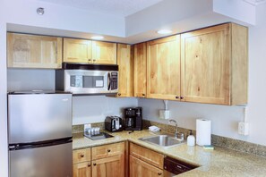 Microwave, stovetop, dishwasher, coffee/tea maker