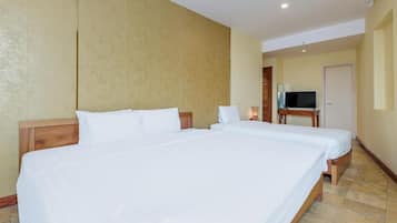 Kamar Triple Superior | Seprai premium, minibar, meja kerja, dan Wi-Fi gratis