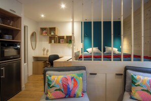 1 chambre, fer et planche à repasser, draps fournis