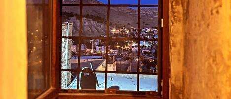 Desk, laptop workspace, blackout drapes, soundproofing