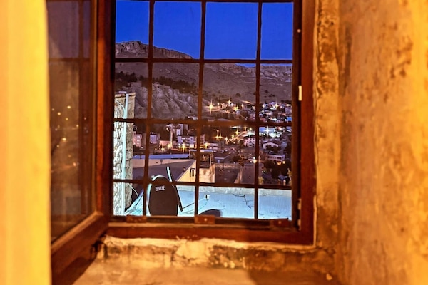 Desk, laptop workspace, blackout drapes, soundproofing