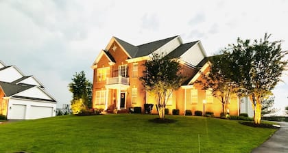 Executive Estate with Lush Green Half-Acre Yard near all amenities