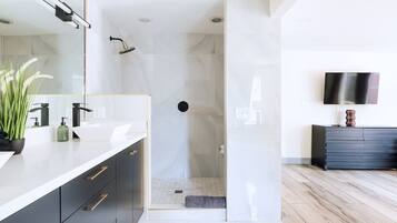 Shower, hair dryer, towels, soap