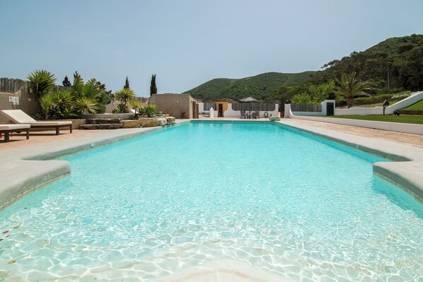 10 outdoor pools, pool umbrellas, pool loungers
