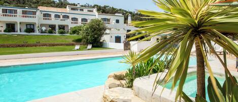 10 outdoor pools, pool umbrellas, pool loungers