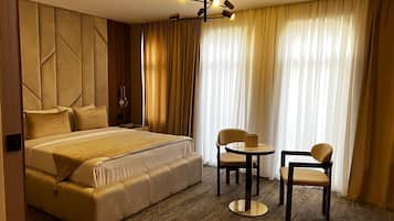 In-room safe, desk, laptop workspace, blackout curtains