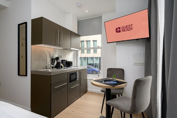 Fridge, microwave, dishwasher, coffee/tea maker