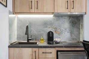 Fridge, microwave, stovetop, coffee/tea maker