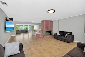 TV, fireplace - Remodeled Home with Heated Pool (Siesta Key)