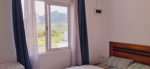 1 غرفة نوم ومكتب ومكواة/لوح كي وسرير سفر