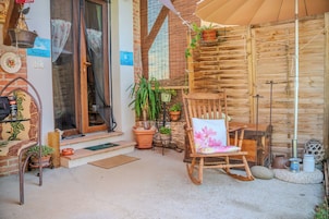 Loft, vista para o jardim | Terraço/pátio