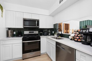 Fridge, microwave, oven, stovetop - Trendy 2-Bedroom Oasis in Central Austin! (Austin)