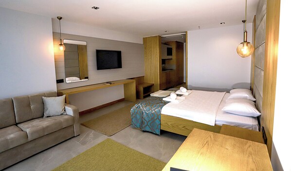 Desk, laptop workspace, bed sheets - Kaleli Deluxe Homes (Kas)