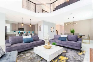 Télévision, lecteur de DVD, baby-foot, chaîne hi-fi