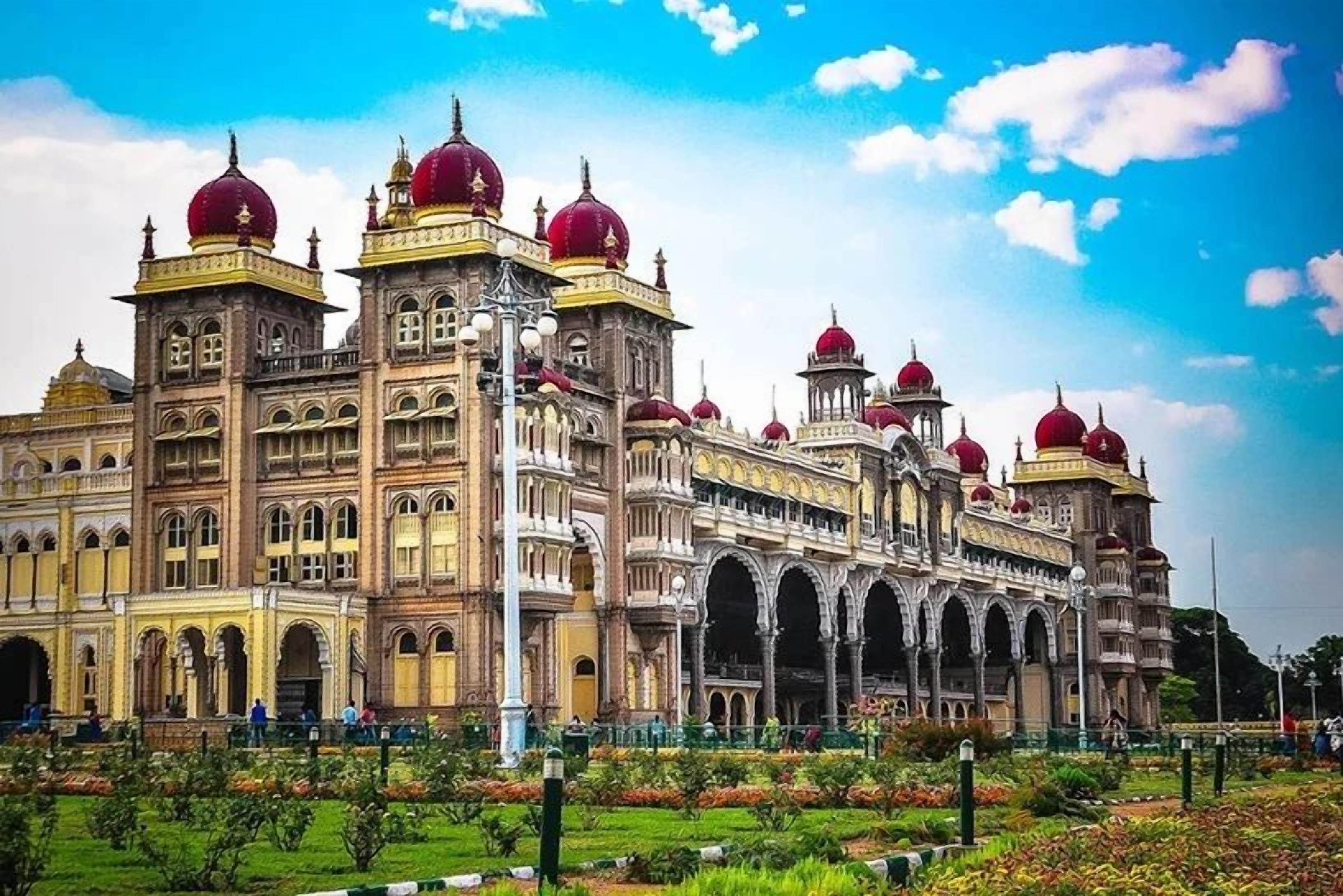 A grand building with multiple domes and arched windows.