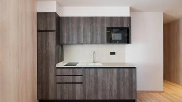 Fridge, microwave, stovetop, coffee/tea maker