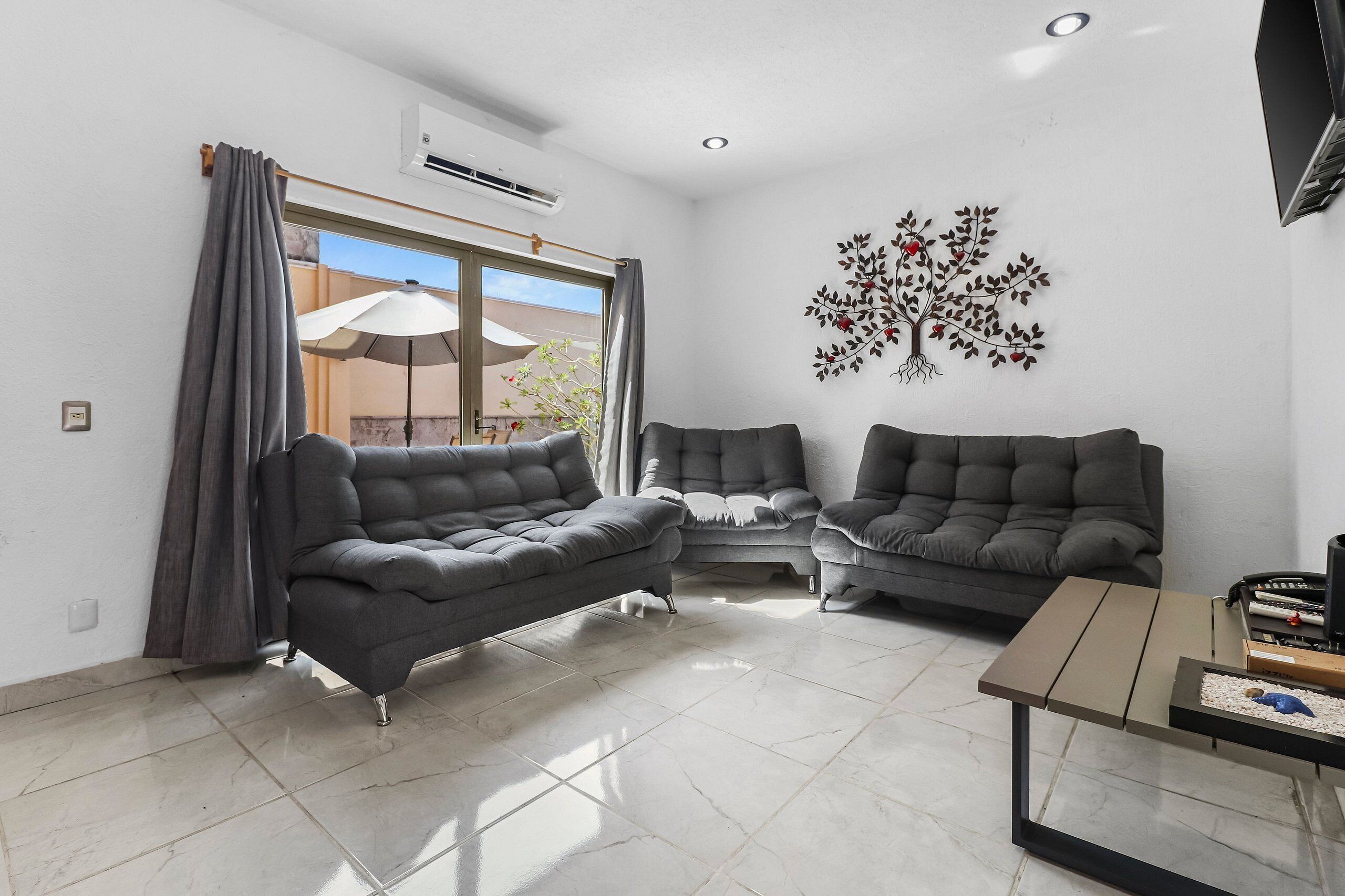 Villa | Living area | 45-inch LED TV with cable channels