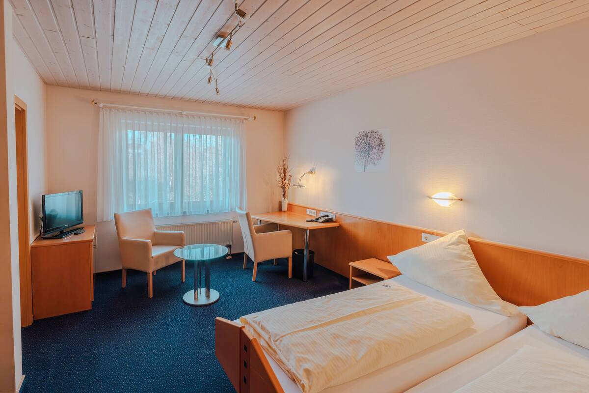 Hypo-allergenic bedding, desk, laptop workspace, free WiFi