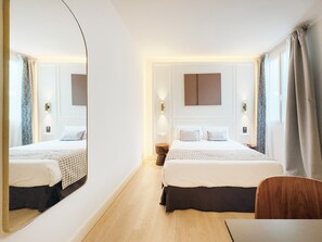 Habitación Confort doble | Caja fuerte, cortinas opacas, sistema de insonorización