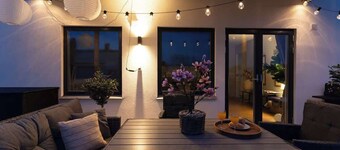 Earthy Ground Floor Home Patio Sunbeds Greenery