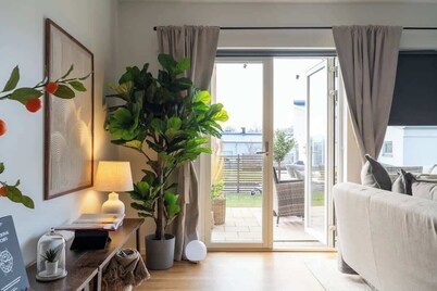 Earthy Ground Floor Home Patio Sunbeds Greenery