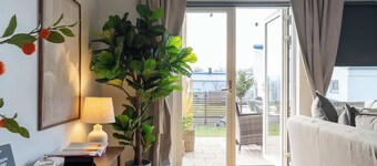 Earthy Ground Floor Home Patio Sunbeds Greenery