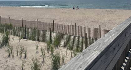Charming two story house in beautiful Fair Harbor, Fire Island minutes to beach.