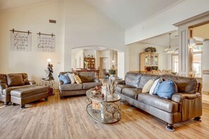 TV, fireplace, books, offices