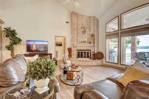 TV, fireplace, books, offices