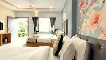 Family Room, Patio, Garden View | Desk, laptop workspace, free WiFi
