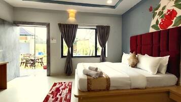 Family Room, Patio, Garden View | Desk, laptop workspace, free WiFi