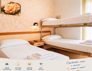 Habitación triple | Escritorio, wifi gratis y ropa de cama 