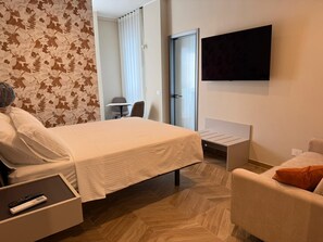 1 habitación, tabla de planchar con plancha, wifi y ropa de cama 